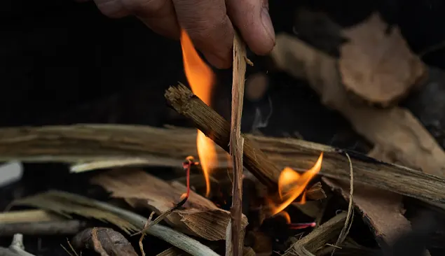 Lighting a  camp fire
